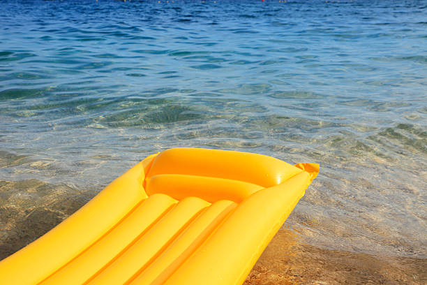 istock Yellow air mattress on the beach 140806426