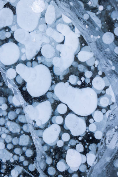 istock metano bubbles frozen inside the ice 1408065984