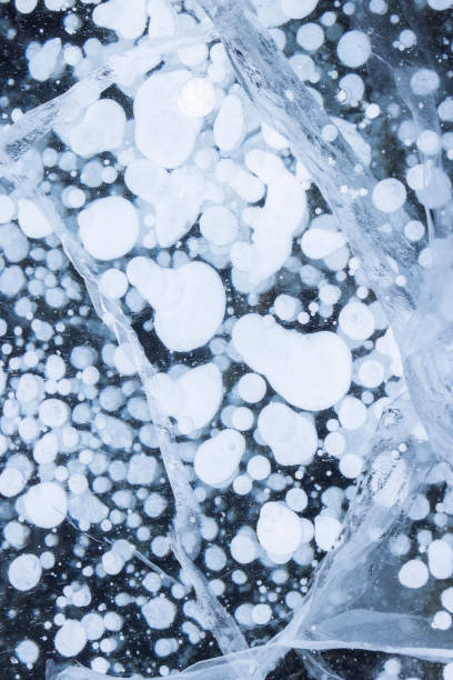 istock metano bubbles frozen inside the ice 1408065988