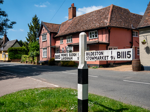 A sign post in the pretty village of Chelsworth in Suffolk, Eastern England. The arms point to the nearby towns and villages of Monks Eleigh, Lavenham, Bildeston and Stowmarket.