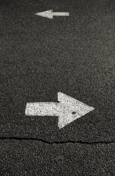 istock Two Arrows in Opposite Directions 1408074109