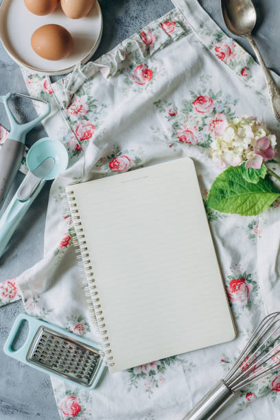 istock recipe book mockup on kitchen table with kitchen utensils in vintage style 1408078969