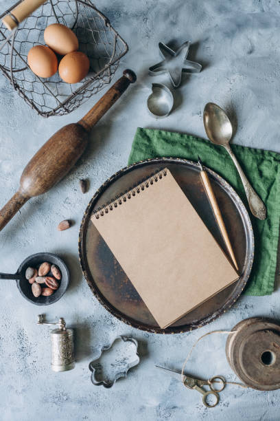 istock recipe book mockup on kitchen table with kitchen utensils in vintage style 1408079021