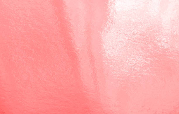 istock Pink foil background with uneven texture 1408083786
