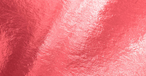 istock Pink foil background with uneven texture 1408085489