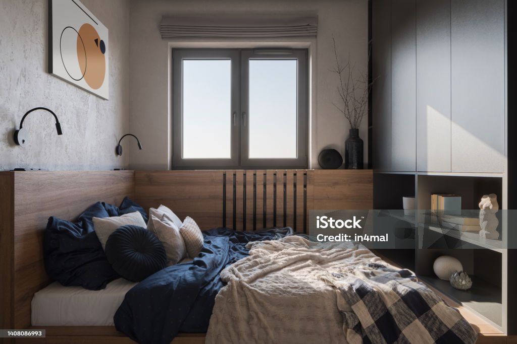 Small and comfortable bedroom with window Small and comfortable bedroom with cozy bed, wooden decor, bookshelf and window Domestic Room Stock Photo