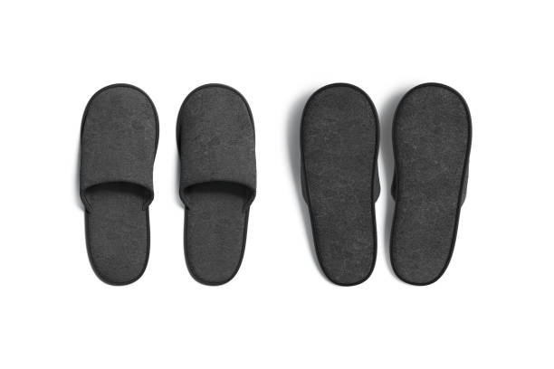 istock Blank black home slippers mockup, top view, front and back 1408089187