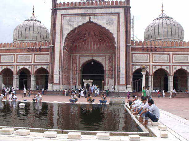 Jama Masjid Mosque, New Delhi, India, August 9, 2011: Many people in the ablutions area of the Jama Masjid Mosque in New Delhi, India