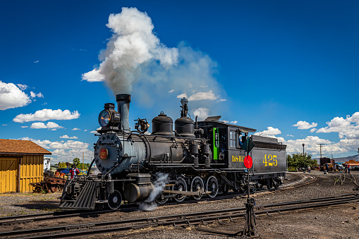 Antonito, CO - August 23, 2021: Coal burning Baldwin steam locomotive Denver and Rio Grande 425 during a public steam up in the Cumbres and Toltec Railroad yard at Antonito, Colorado.