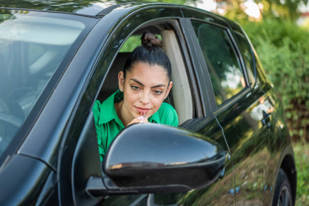 istock Girl in the car 1408095138