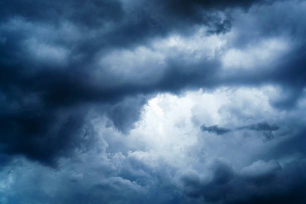 istock Storm clouds with a bright skylight in the center 1408096469