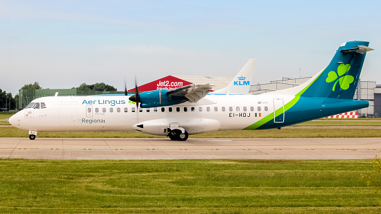 Manchester Airport, United Kingdom - 16 June 2022: Aer Lingus ATR 72 (EI-HDJ) preparing for take off to Dublin, Ireland.