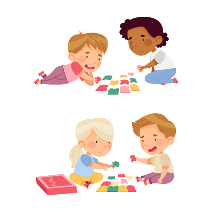 Little Children Solving Puzzle Together Education And Development