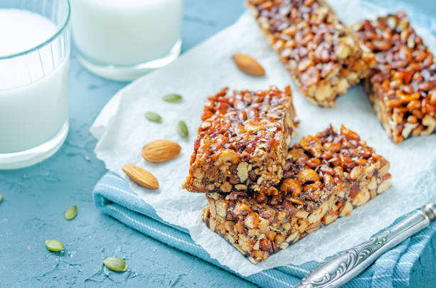 istock Healthy honey nuts bars with milk 1408103441