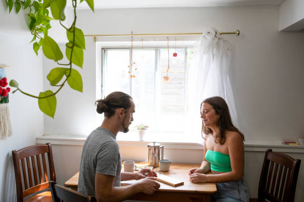 istock Young couple enjoy time together in home setting 1408109231