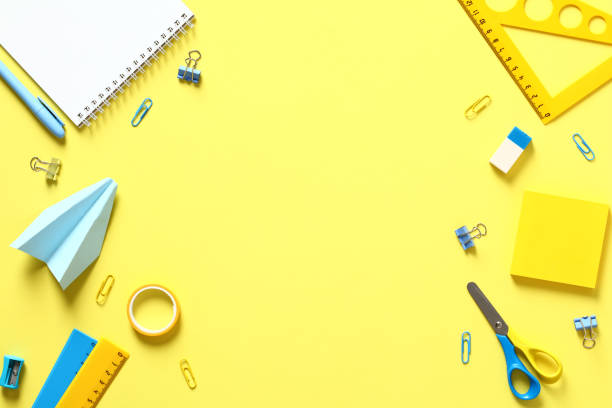 istock Flat lay school stationery on yellow table. Back to school concept. 1408109428