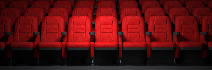 Red seats rows in empty cinema hall. Movie theatre and cinema concept. 3d illustration