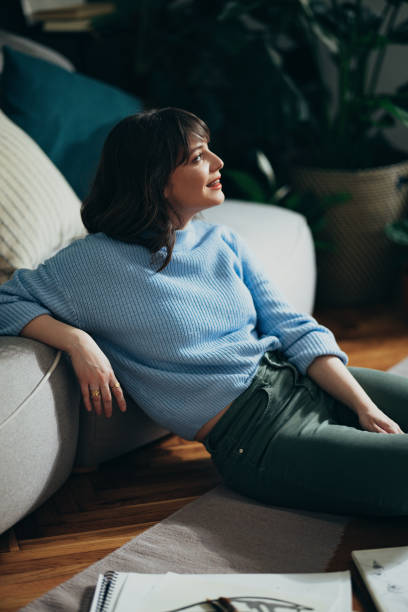 istock Happy Woman Relaxing At Home 1408110208