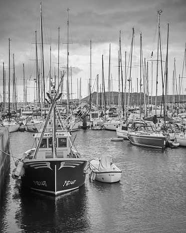 Golf del Sur, Tenerife, Spain - December 7, 2019: Sail yachts and boats at Marina San Miguel. Black and white photography