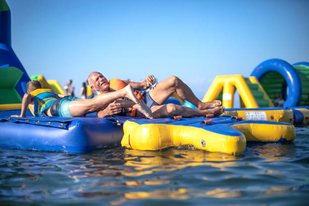istock Old senior having fun in Water Park 1408113559