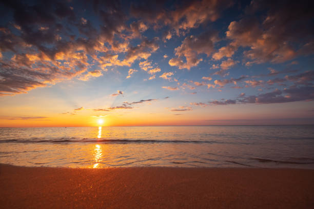istock Beautiful cloudscape over the sea waves and beach 1408116864