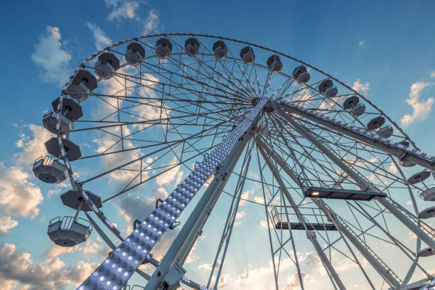 istock Ferris Wheel with Blue Sky and clouds 1408116943