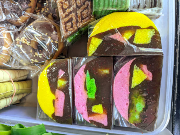 istock pudding, thinly sliced and wrapped in plastic, sold on the roadside, a traditional Indonesian snack 1408117782