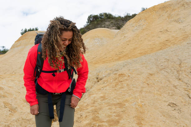 istock latin woman walks through desert surrounded by nature 1408119842