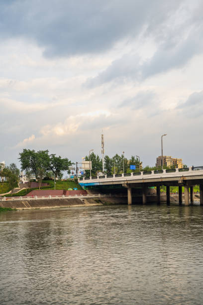 istock Riverside and financial city burning clouds 1408120836