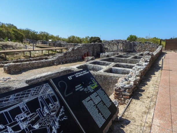 The Roman Ruins of Troia, Portugal. Setubal, Portugal - August 04 2019: The Roman Ruins of Troia, Portugal.  The ruins, which include fish processing facilities, thermal baths, and burial sites are from between the 1st to 6th centuries troia stock pictures, royalty-free photos & images