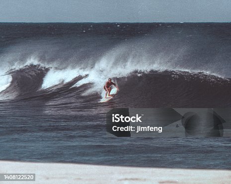 istock Surfers in Hawaii, positive Film scanned, Honolulu, USA 1408122520