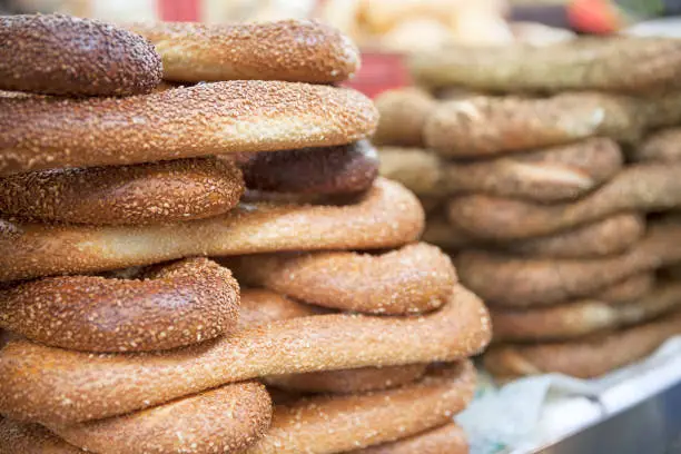 Stacks of freshly-baked Jerusalem bagels at Carmel Market, Tel Aviv