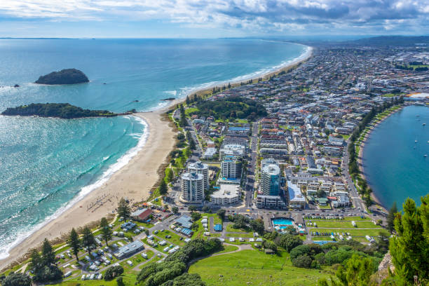 Mount Maunganui summit view.  Tauranga, Bay of Plenty, North Island, New Zealand. View from the summit of Mt Mauao volcano in Mount Maunganui, colloquially known as "The Mount". Panoramic view of the city and bay. Tauranga, Bay of Plenty, North Island, New Zealand. north island new zealand stock pictures, royalty-free photos & images