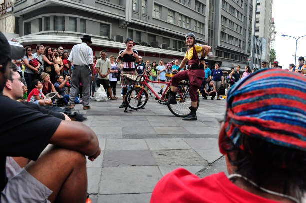 Porto Alegre, Rio Grande do Sul, Brazil - Nov 17th, 2010: People watching a street performance at Democratic Corner