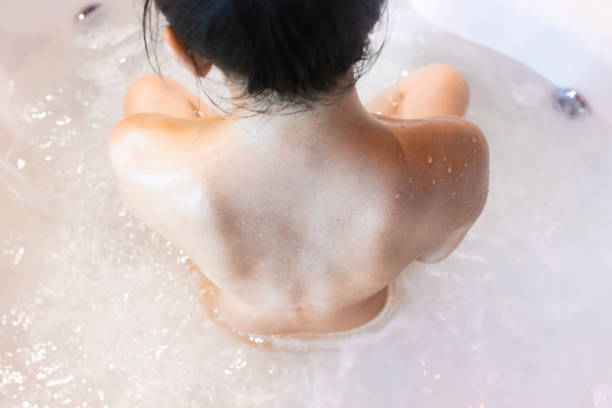 istock Person sitting in the bathtub 1408131606