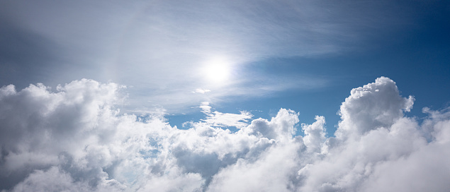 sunlight shining through clouds sky background