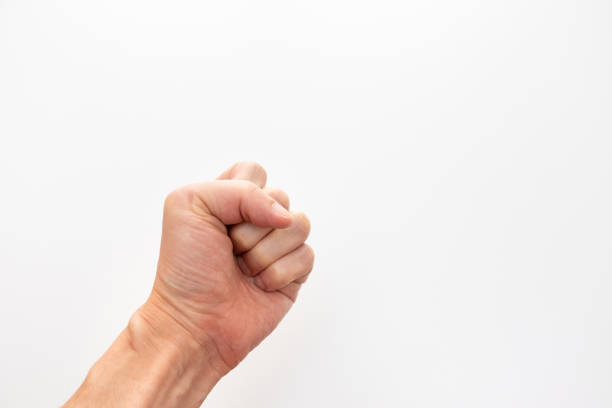 Make a fist with left hand Make a fist with left hand punching one person shaking fist fist stock pictures, royalty-free photos & images