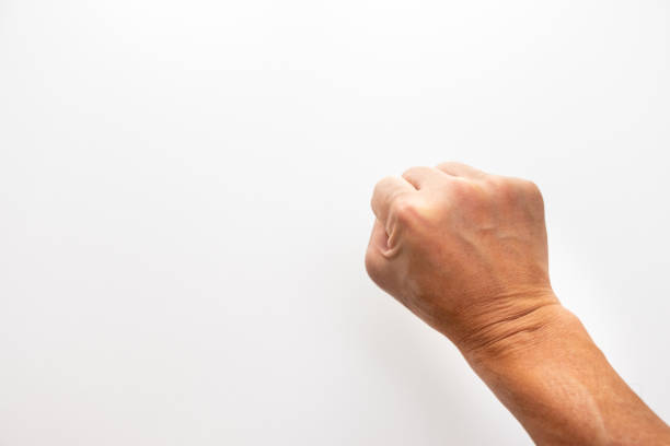 Stick out the fist of the right hand Stick out the fist of the right hand punching one person shaking fist fist stock pictures, royalty-free photos & images