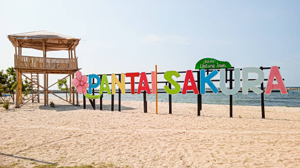 istock Sakura Beach Name Sign in Untung Island Java, Thousand Islands, Travel and Tourism, Landmarks 1408145708
