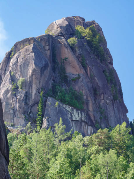 istock High forest rocks for advanced hiking and alpinism. 1408146418