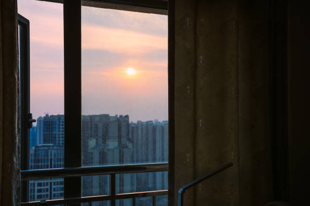 istock The bustling city outside the sunset window 1408150612