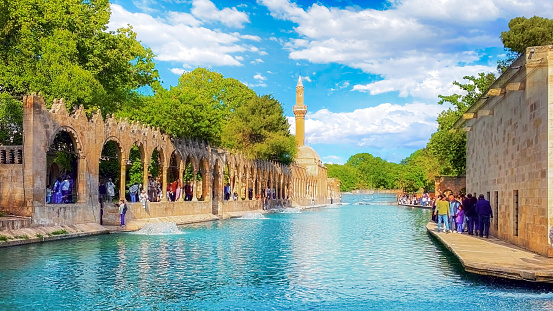 Balıklıgöl is a pool in the southwest of the city center of Şanlıurfa, Turkey known in Jewish and Islamic legends as the place where Nimrod threw the Prophet Abraham into a fire. Balıklıgöl and neighbouring Aynzeliha pools are among the most visited places in Şanlıurfa.