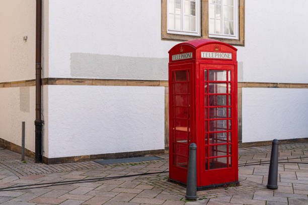 istock Red telephone booth in English style. 1408161767