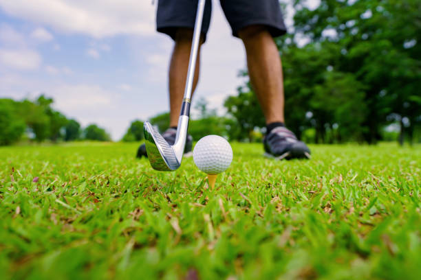 istock Golf ball on green grass ready to be struck on golf course 1408162659