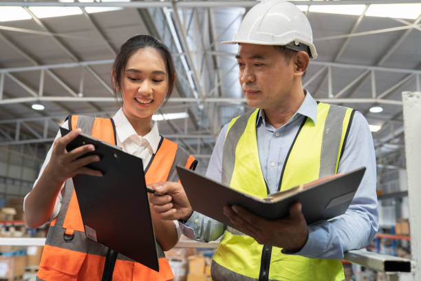 istock Staff in warehouse factory 1408169819