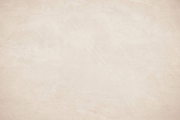 istock Old concrete wall texture background. Close up retro plain beige color cement material surface rough for show or advertise promote product content on display and brown paper design element concept. 1408171221