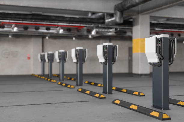 empty parking garage with electric vehicle charging stations - power supply power supply box power equipment imagens e fotografias de stock