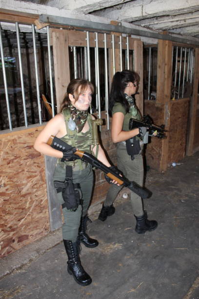 istock two female soldiers 1408172614