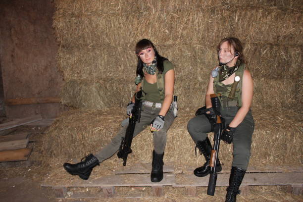 istock two female soldiers 1408172636
