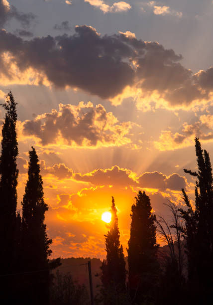 istock Golden summer sunset with beautiful Cumulus clouds in Greece 1408175709